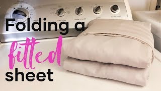 Folding A Fitted Sheet  How To Fold Sheets [upl. by Pillsbury258]