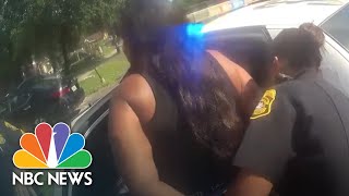 Watch Officer Points Gun At Black Woman For Over 4 Minutes In Suspected Stolen Car  NBC News NOW [upl. by Lyram]