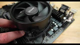 How to properly install Ryzen CPU and Stock AMD Cooler [upl. by Hastie142]