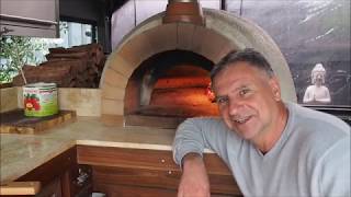 How to Use a Wood Fired Pizza Oven [upl. by Avehsile]