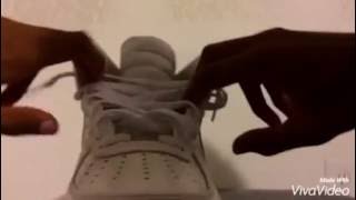 How to lace Nike Air Force 1 highs and put the strap on back [upl. by Ardnauqal634]