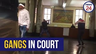 WATCH Police draw arms as rival gang members clash in Joburg court [upl. by Niro189]