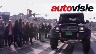 Driving monstrous Mercedes G63 AMG 6x6 through Amsterdam English subtitled  Autovisie [upl. by Enyaht]