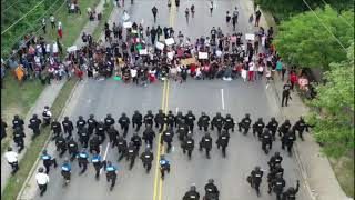 Fayetteville officers kneel in solidarity with protesters [upl. by Nnayram790]